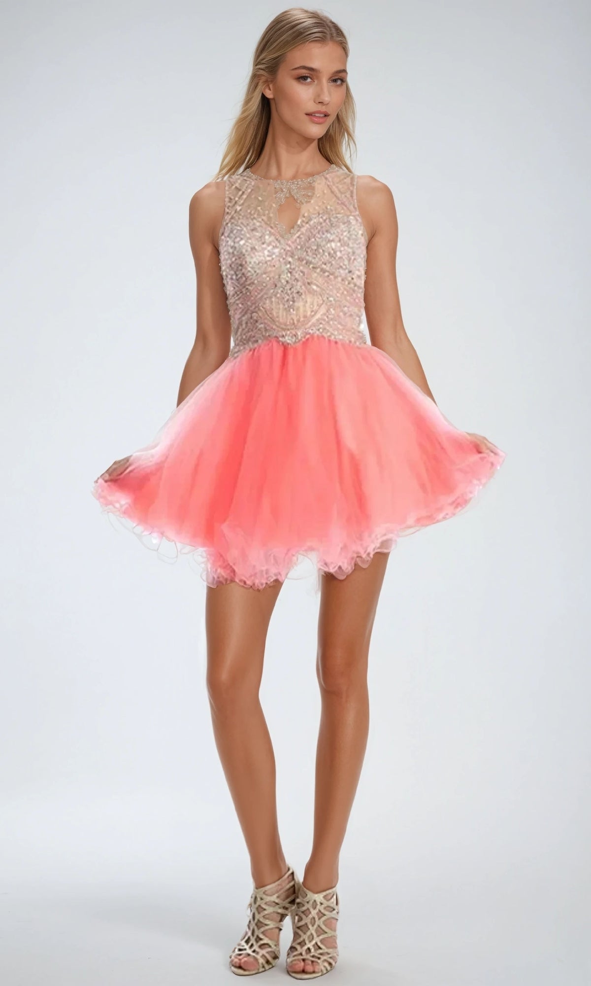 A woman models the Juliet 761 short party dress, featuring a sleeveless beaded bodice and A-line tulle skirt, paired with open-toe heels against a plain background—an ideal pick for a stunning hoco look.